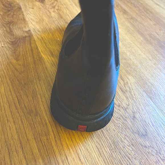 a pair of Prada boots - Picture 3 of 4